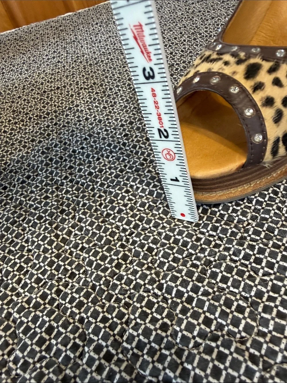Animal print wedges with rhinestone trim. Leather upper size 8.